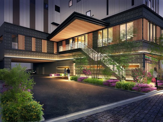 Traditional ryokan exterior used as an overnight-atmosphere reference, not a named Miyajima property